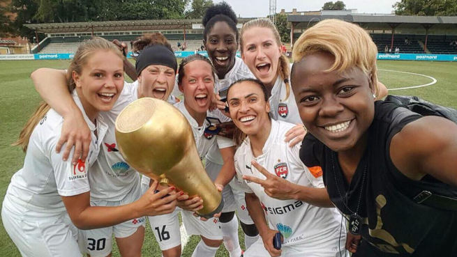 Anita Asante with her team-mates in Sweden