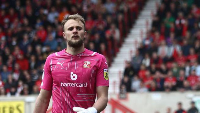 Lewis Ward in action for Exeter City