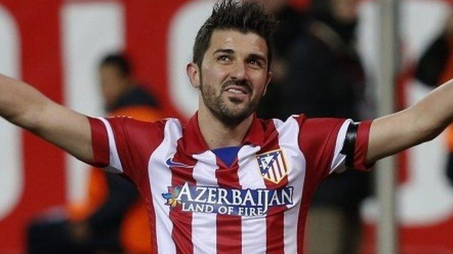 Atletico Madrid's David Villa celebrates his goal against Real Sociedad