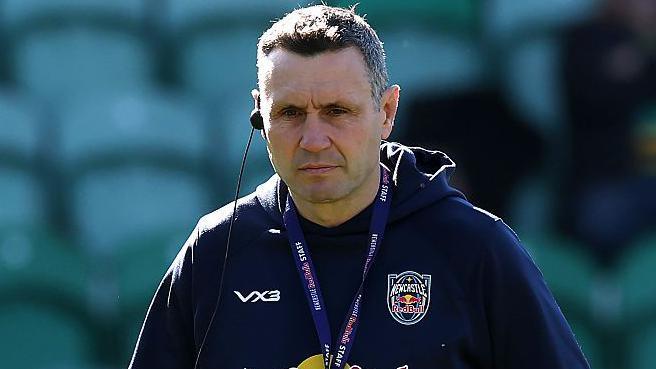 Stephen Jones, head coach of Newcastle Red Bulls, looking on prior to his side's Prem fixture against Northampton Saints at Franklin's Gardens.