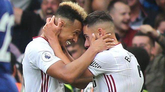 Callum Robinson (left) and George Baldock celebrate Sheffield United's second goal during Chelsea vs Sheffield United, Premier League Football at Stamford Bridge on 31st August 2019