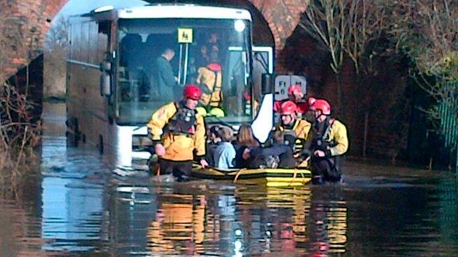 Children saved from trapped bus