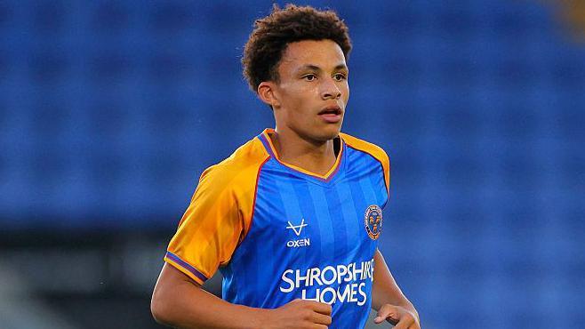 Will Gray in action for Shrewsbury Town 
