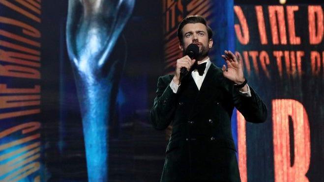 Jack Whitehall presenting the Brits in a suit