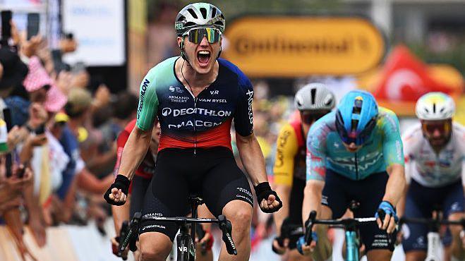 Olav Kooij wins stage five