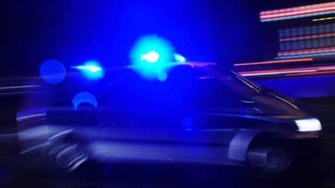 Police vehicle with lights flashing