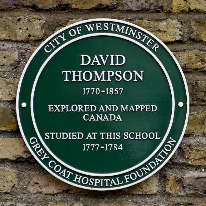 A green plaque on the wall of Grey Coat school. The white writing reads : "David Thompson, 1770-1857, Explored and mapped Canada, Studied at this school,
1777-1784. Grey Coat Hospital Foundation" It was unveiled in 2009 by explorer and TV personality Ray Mears.