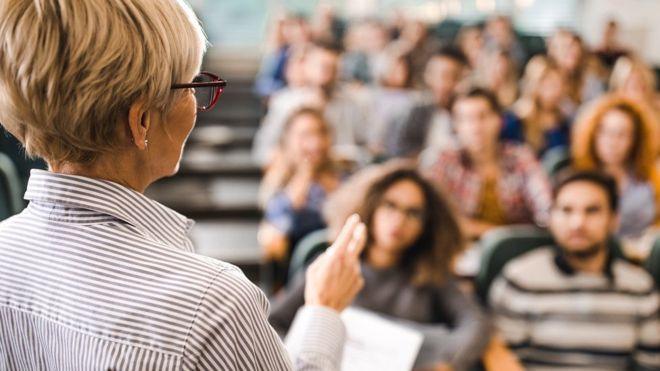 Lecturer in front of a class