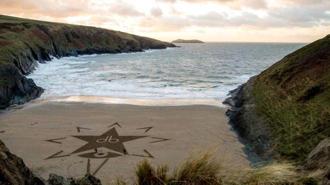 David Bowie Blackstar album logo on the sands at Mwnt beach