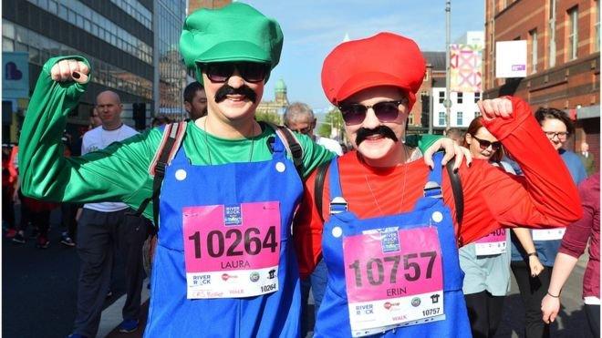 Runners in Mario and Luigi costumes