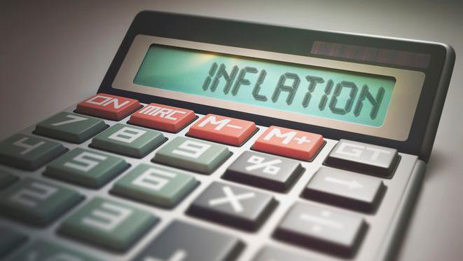 Calculator with inflation written on it.