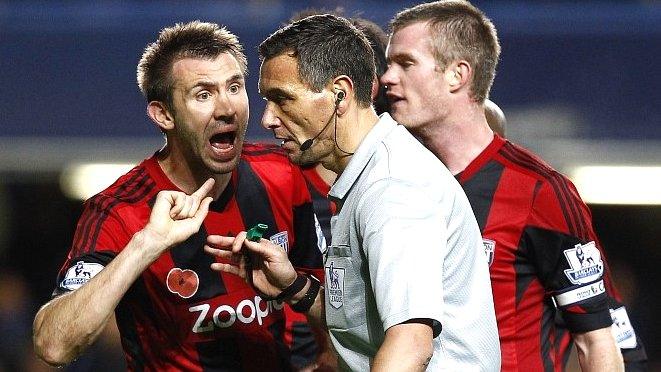 West Brom protest to referee Andre Marriner at Stamford Bridge