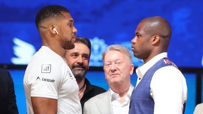 Anthony Joshua faces off with Daniel Dubois at a news conference