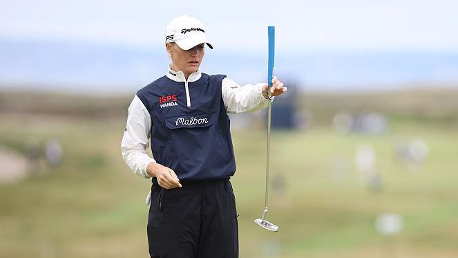 Charley Hull lines up a putt at Royal Porthcawl this week