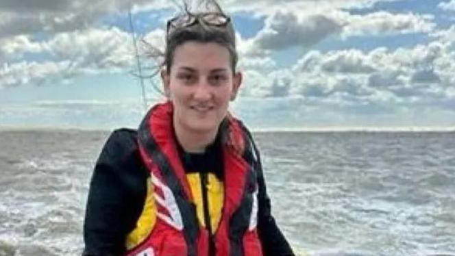 Becky Cannon on a lifeboat at sea