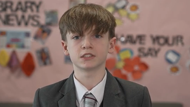 a boy in school uniform