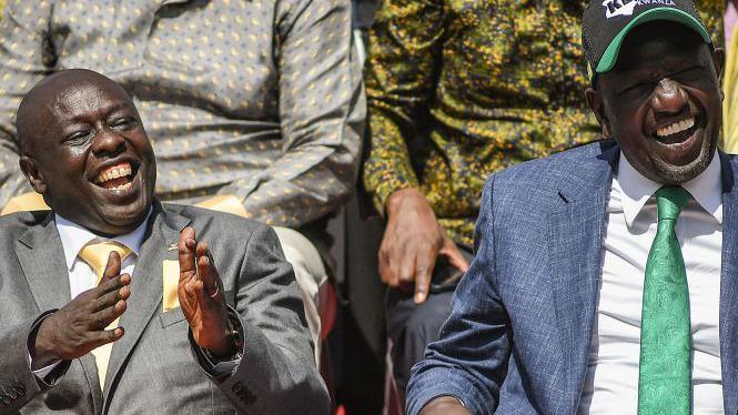 William Ruto (R) sits next to Rigathi Gachagua in Karen, Nairobi, on 15 May 2022