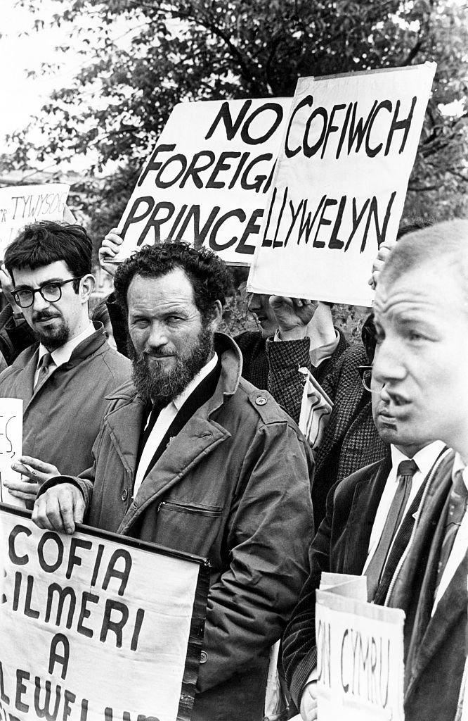 Demonstrators await the arrival of Prince Charles and Prince Philip, Duke of Edinburgh in Cardiff in 1968.