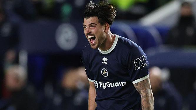 Frenchman Tristan Crama celebrates scoring Millwall's winner in stoppage time