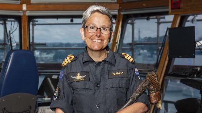 Commander Yvonne Gray pictured on a ship