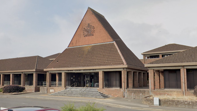 A Google Street image of a red-bricked building which is Guildford Crown Court.