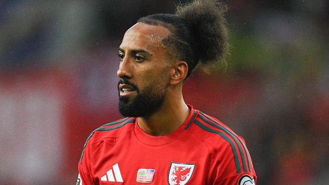 Winger Sorba Thomas pictured on international duty with Wales