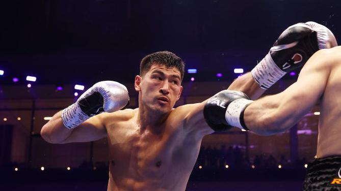 Dmitry Bivol throws a punch