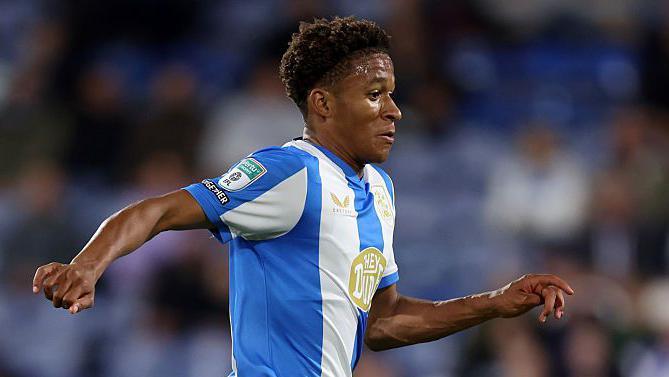 Jay Smith-Sway in action for Huddersfield Town.