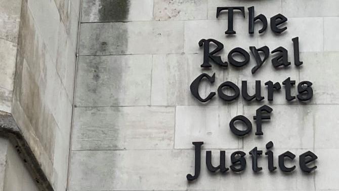 Royal Courts of Justice sign