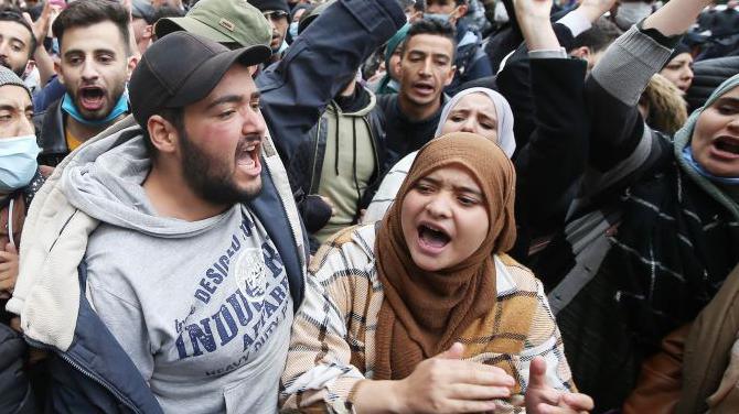 Students chant slogans during a demonstration in the centre of the Algerian capital, Algiers, on 23 February 2021, the day after the second anniversary of the Hirak protest movement