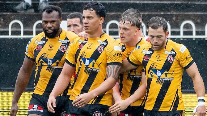 Castleford celebrate Daejarn Asi's try against Warrington