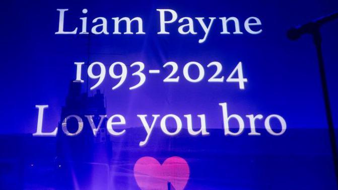 A written tribute to Liam Payne appears onscreen during Zayn's performance at O2 Academy Leeds on November 23, 2024 in Leeds, England.
