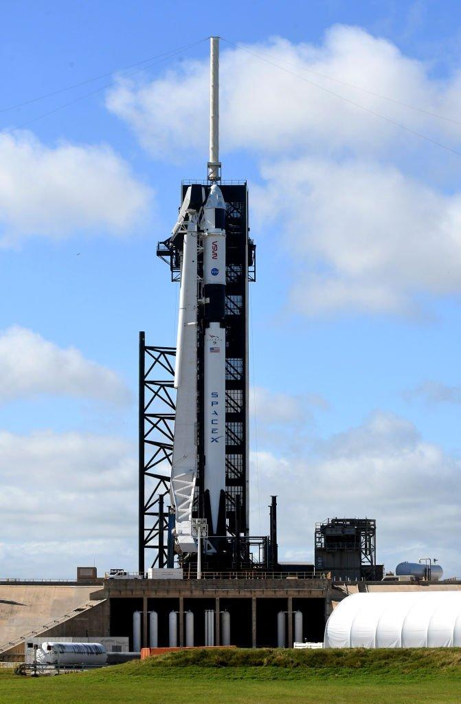 A SpaceX Falcon 9 rocket carrying the Crew Dragon spacecraft is seen at pad 39A at the Kennedy Space Center in Florida.