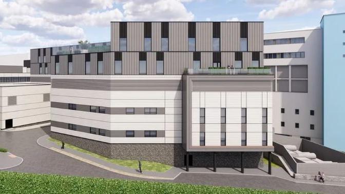 CGI image of the planned building. It shows how it will look alongside the existing building.