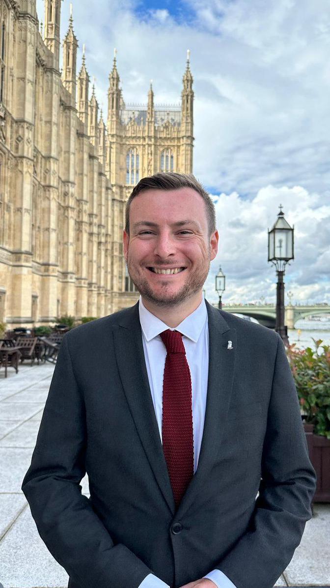 Peter Swallow on the terrace outside the Houses of Parliament 