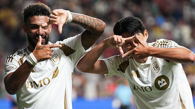 Denis Bouanga and Son Heung-min celebrate Son's hat-trick goal for Los Angeles FC  against Real Salt Lake