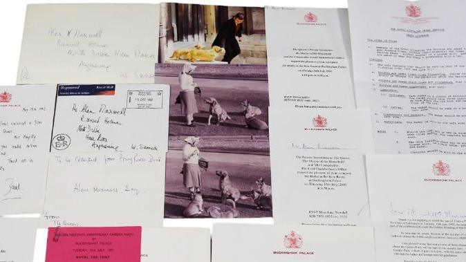 Items sold at auction including thank you notes from Queen Elizabeth II and some photographs of her with her dogs, two in black and white and one in colour 