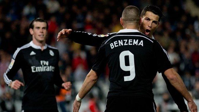 Gareth Bale, Cristiano Ronaldo and Karim Benzema celebrate