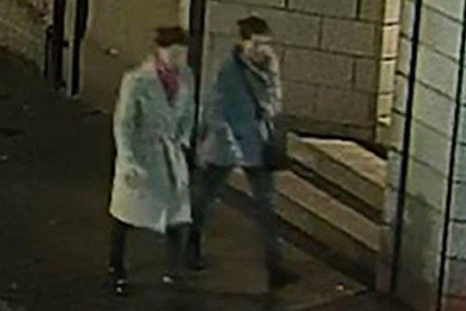 CCTV image of two missing sisters - Eliza and Henrietta Huszti - walking while wearing jackets