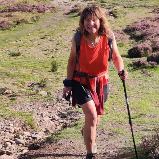 Lorraine McCall walking up a hill