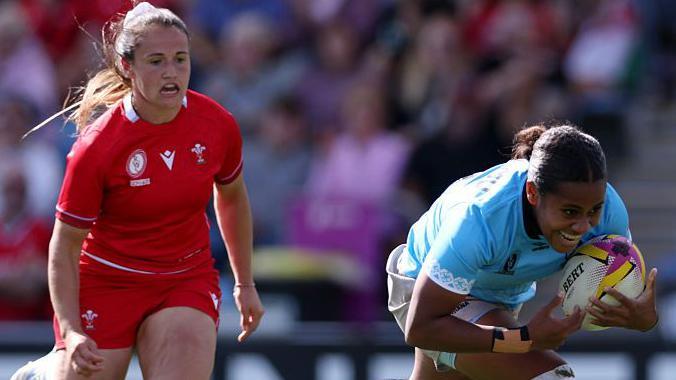 Josifini Neihamu of Fiji scores her team's second try