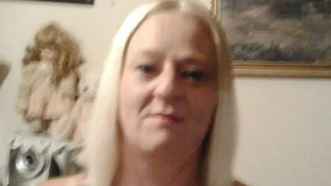 Elaine Clarke, with platinum blonde hair, looks directly at the camera in a photograph posted on Facebook