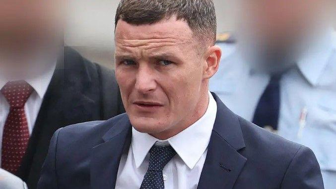 Kielan Mooney seen in a navy suit with short brown hair at a previous court hearing 