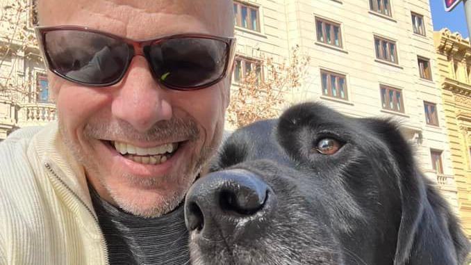 Terry Quinn with his guide dog, Spencer