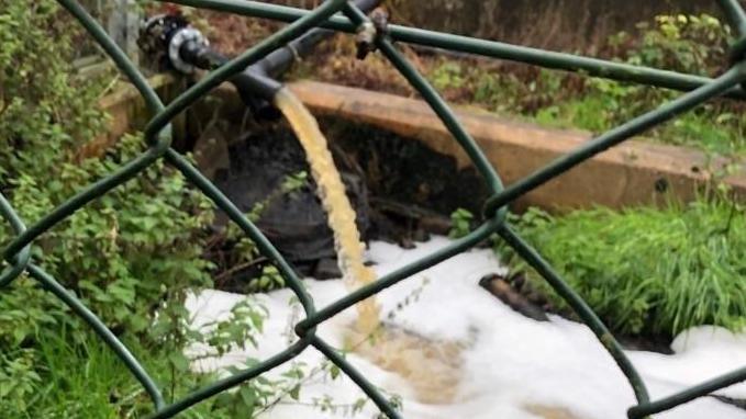 Water going into local streams is orange. 