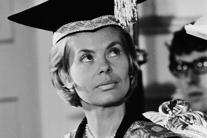 A black and white photo of The Duchess of Kent in early adulthood. She is wearing a mortar board and looking off camera.