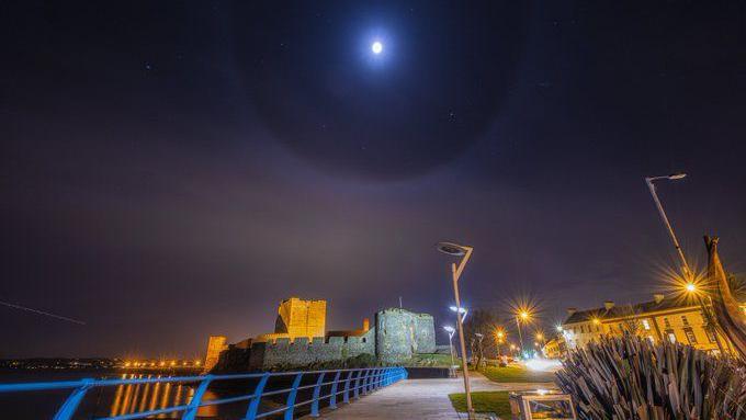 Moon halo over Carrickfergus Castle