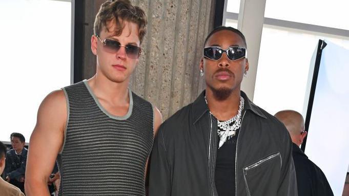 Joe Burrow and Justin Jefferson posing at Paris fashion week