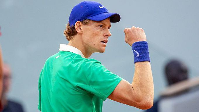 Jannik Sinner celebrates winning a point at the French Open