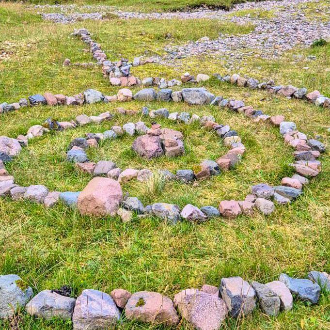 Stones used to create a spiral shape in Glen Coe's Lost Valley